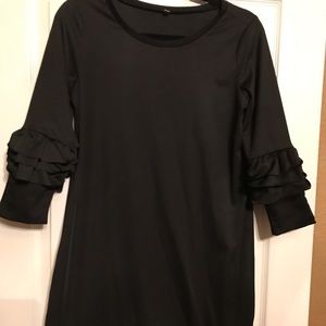 Right above the knee black dress with ruffles three-quarter length sleeves